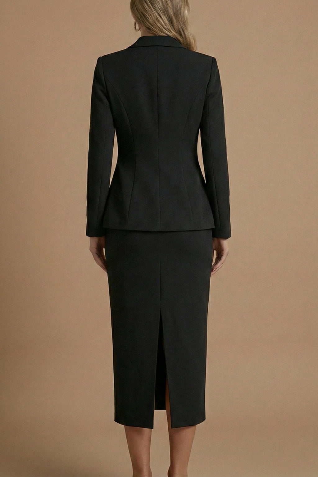 Detail shot of midi skirt waistband and tailoring