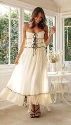 Close-up of sweetheart neckline and lace-up bodice detailing