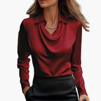 Three-quarter view of blouse on model