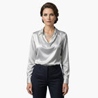 Front tucked styling of blouse with tailored trousers