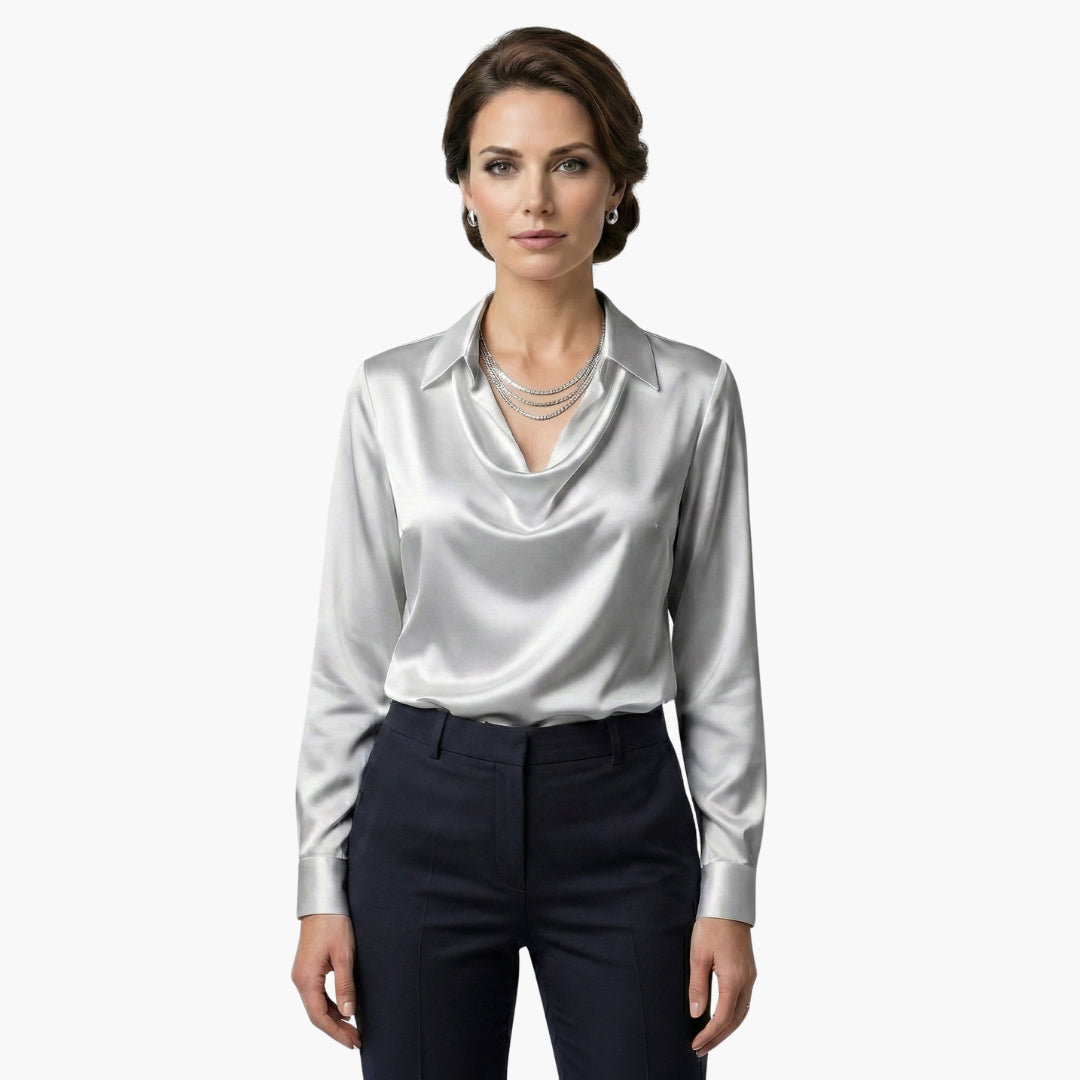 Front tucked styling of blouse with tailored trousers