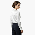 Side view of satin blouse showing neckline structure