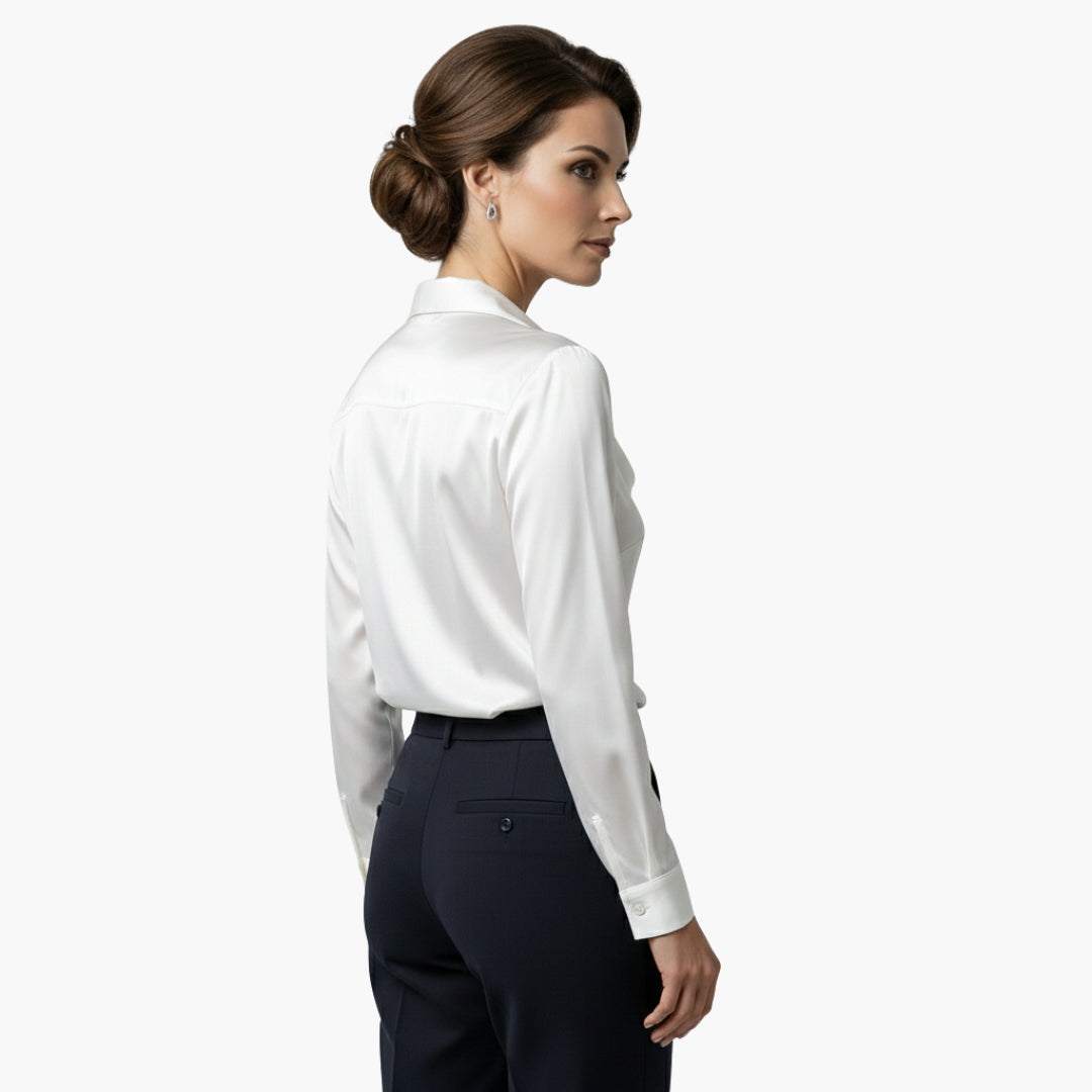 Side view of satin blouse showing neckline structure