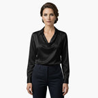Model wearing blouse with tailored trousers, full-length shot