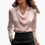 Close-up of collar point and structured neckline