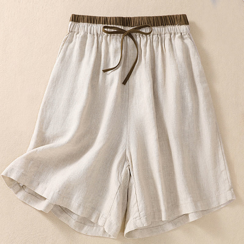 Side profile of relaxed fit shorts on model