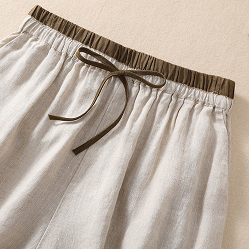 Close-up of elasticated waistband with drawstring detail