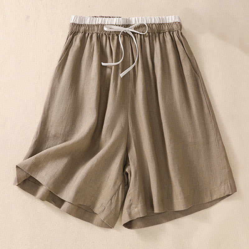 Women's relaxed knee-length shorts in natural linen, front view