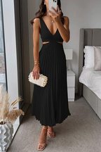 Back view of midi dress showing V-neckline and pleated design