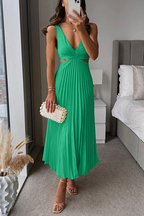 Model posing in pleated midi dress, full-length movement shot
