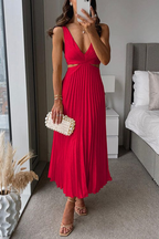 Model wearing pleated midi dress, side profile showing twisted waist