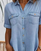 Rear view of denim midi dress showing back seaming