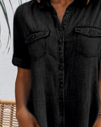Woman wearing dress showing rolled short sleeves detail