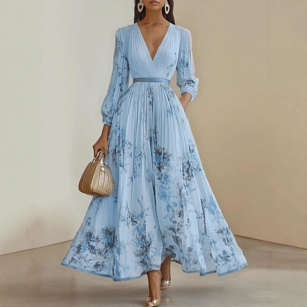 Detail of soft blue floral print on dress fabric