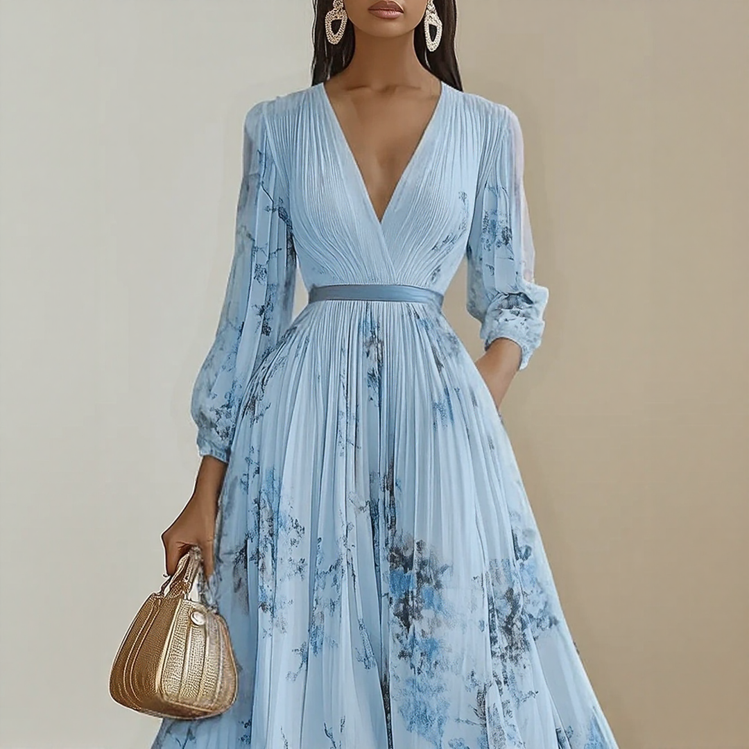 Model posing in dress with hand on waist