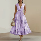 Close-up of pleated V-neckline detail on floral dress