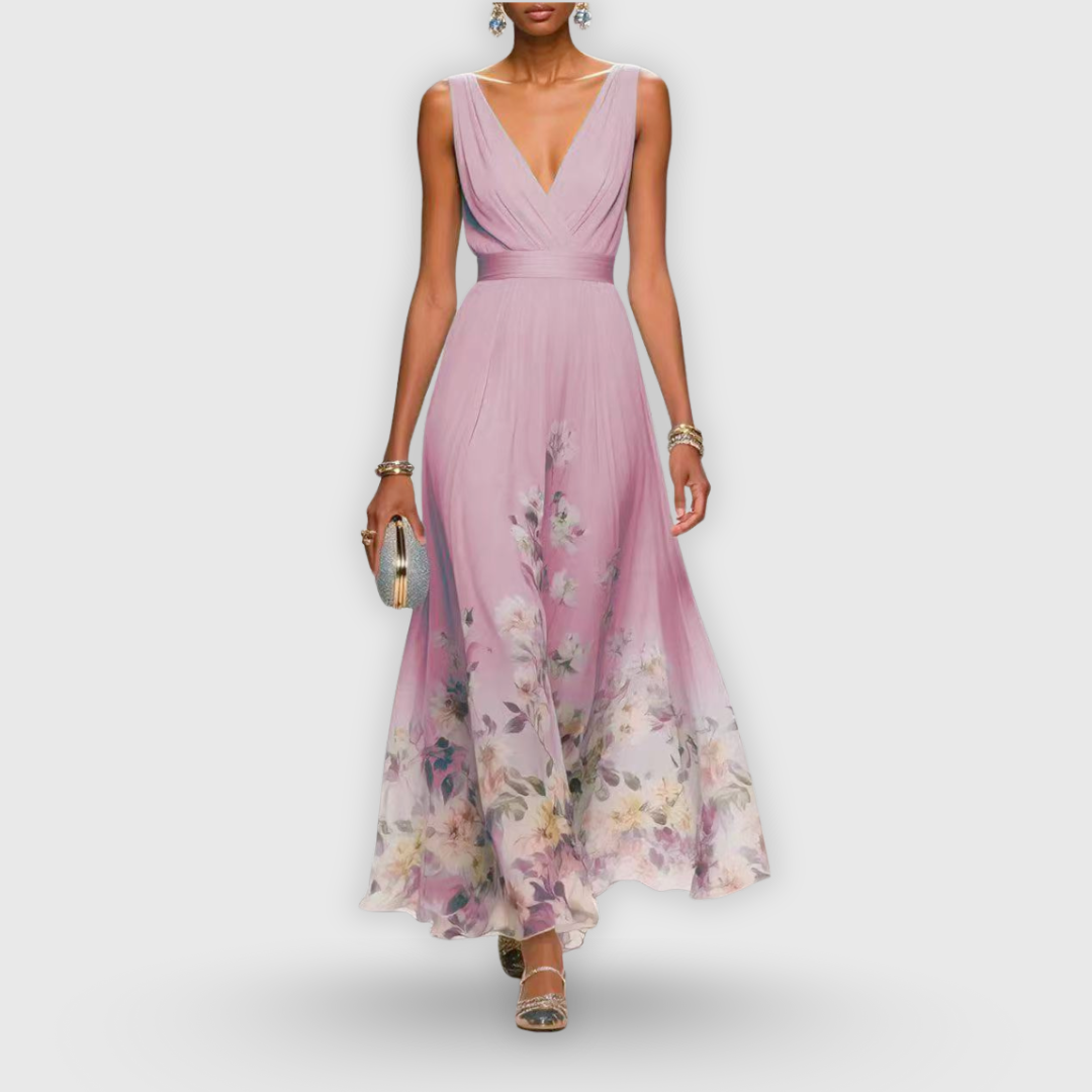 Model wearing floral maxi dress in standing pose, full length shot