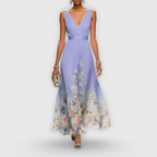 Close-up detail of delicate floral print and A-line skirt
