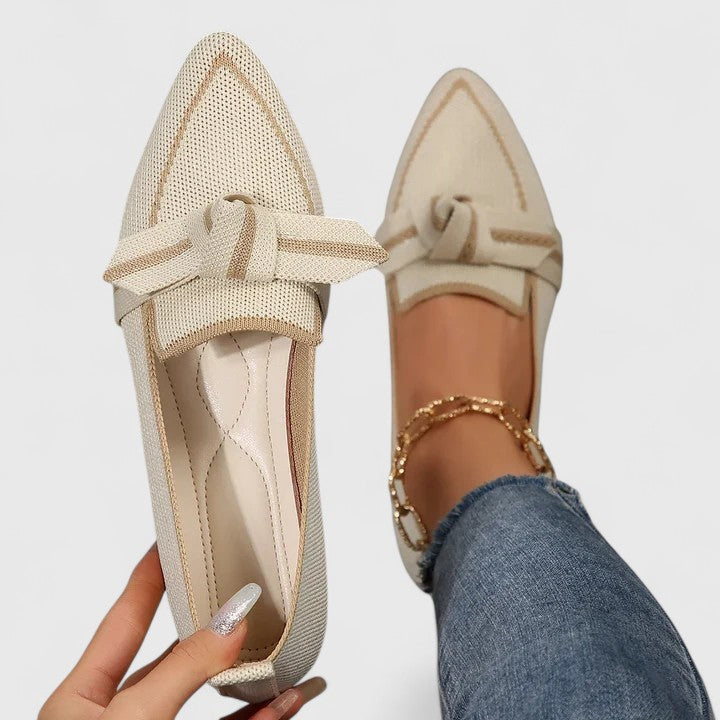 Flat lay of single loafer displaying knit texture and overall construction