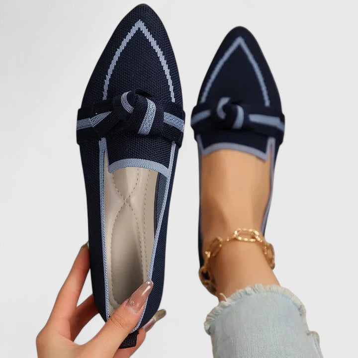 Woman walking in light blue bow loafers, casual wear