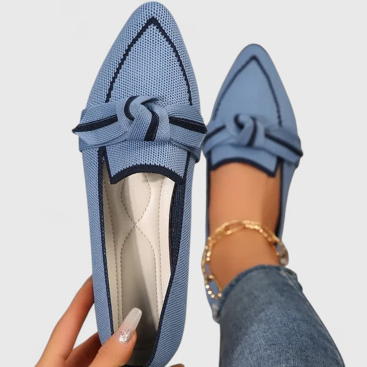 Light blue knit slip-on loafer with bow detail, front-facing view
