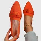 Top-down view of light blue loafer showing arch support