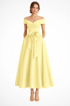 Detail of bow waist accent and fitted bodice