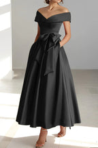 Close-up of off shoulder neckline and décolletage