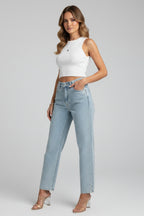 Model from side angle showing high waistband and straight leg silhouette