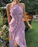 Halter neckline and cross-back strap detail on maxi dress