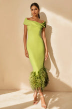 Model wearing off shoulder dress, side profile pose