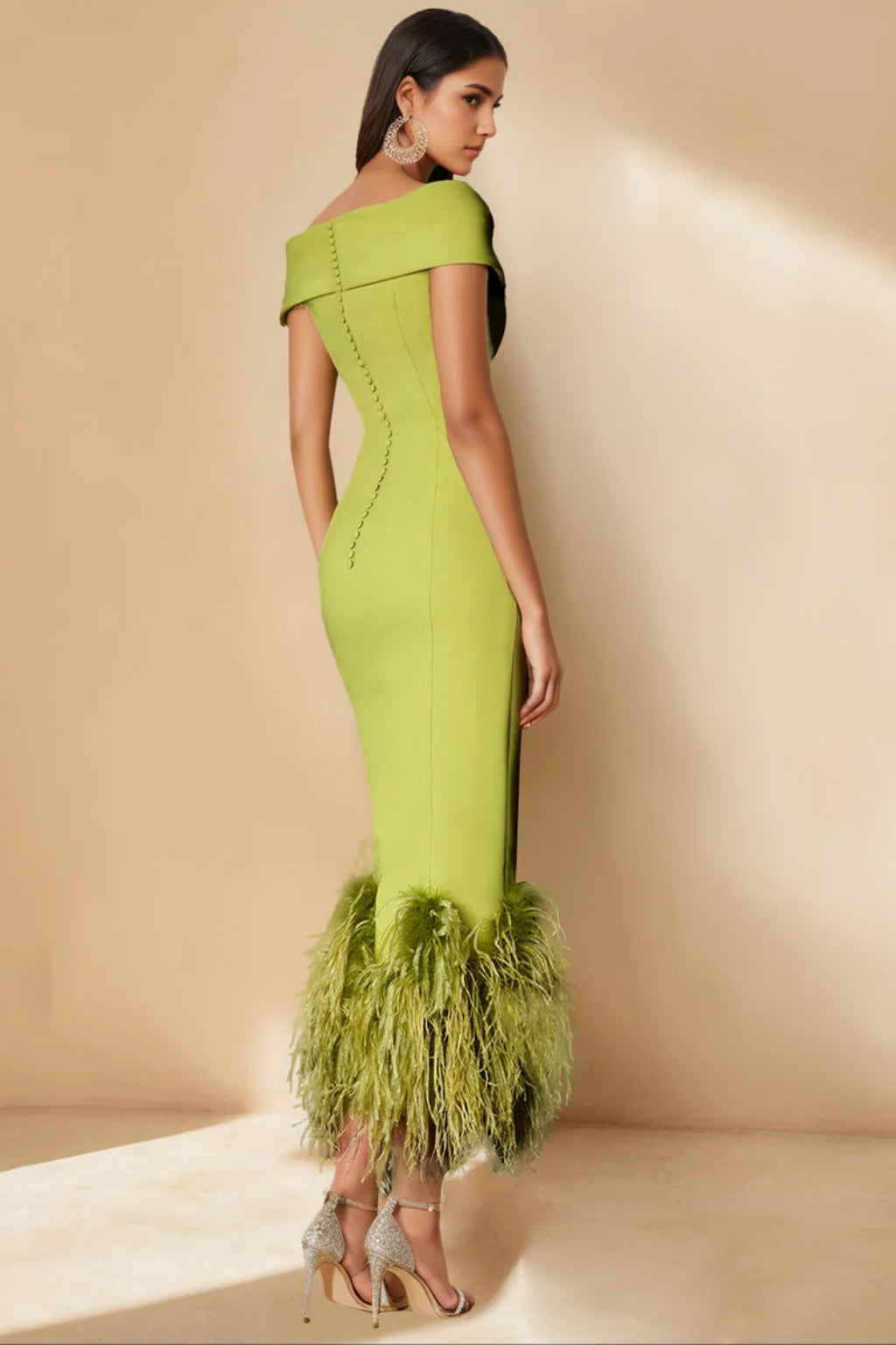 Back view of feather hem midi dress with structured neckline