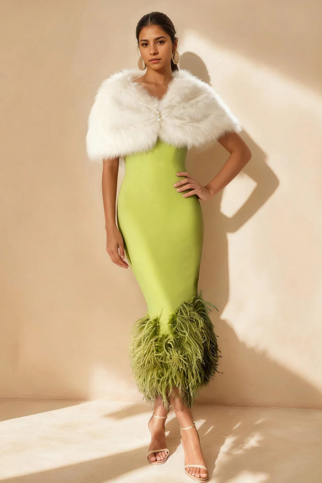 Close-up of feathered hem detail on midi dress