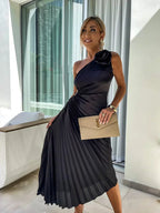 Back view of one shoulder midi dress with pleats