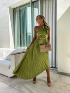 Model wearing one shoulder dress, full length standing pose