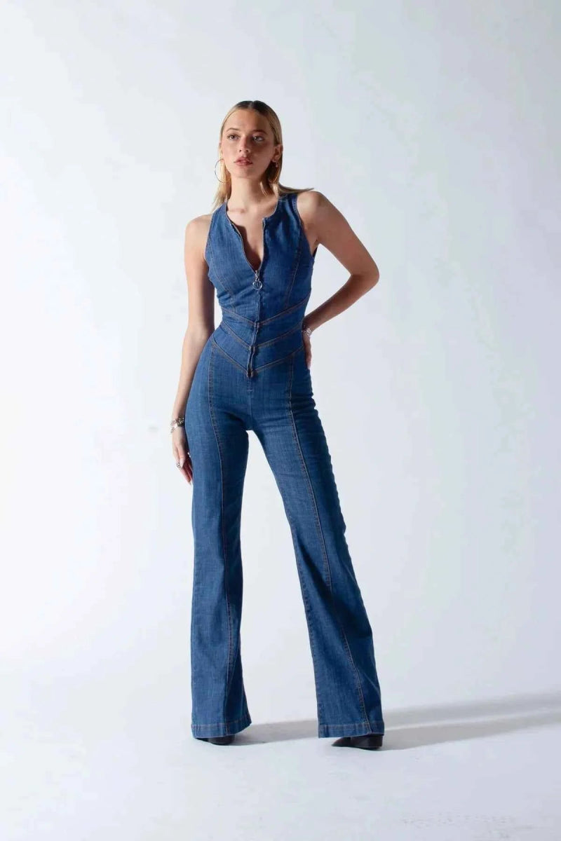 Women's mid-blue denim sleeveless jumpsuit with zip-front, displayed on model