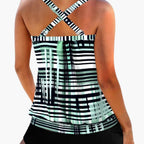 Model wearing mint green striped tankini top, side angle