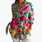 Back view of floral shirt on model, showing print distribution and relaxed fit