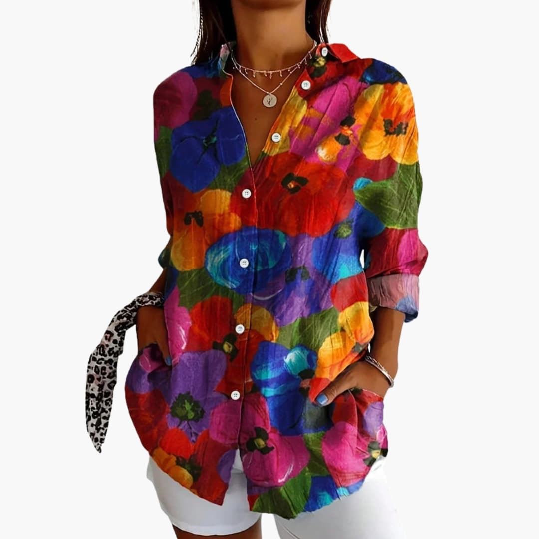 Abstract blouse worn casually, three-quarter view demonstrating colour palette