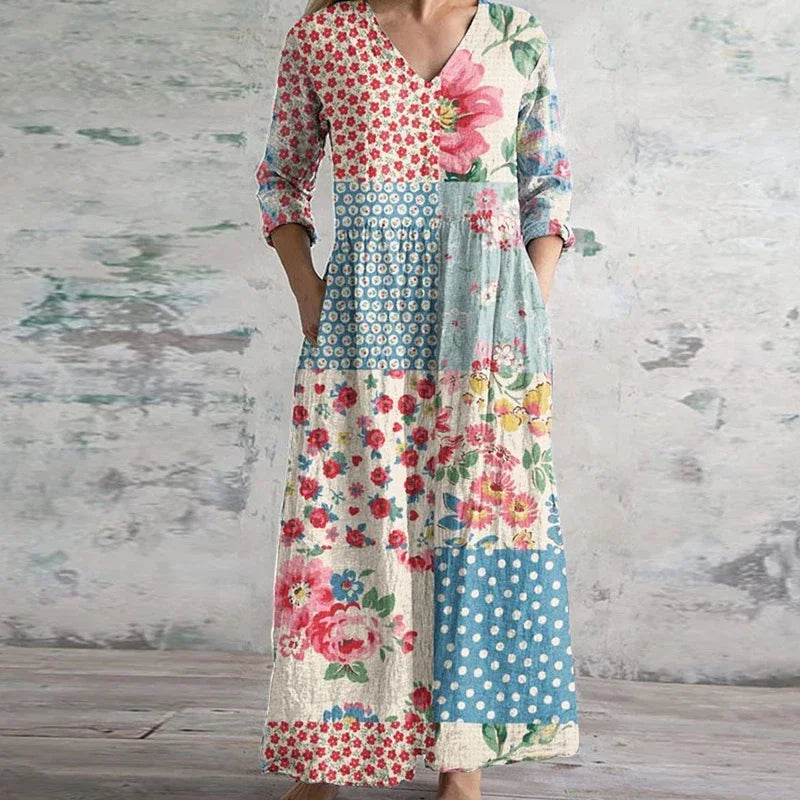 Woman wearing floral patchwork v-neck maxi dress, full-length front view
