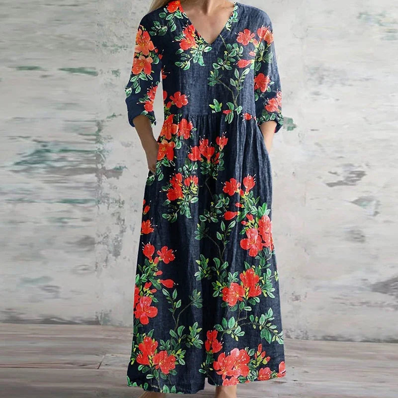 Rear view of patchwork maxi dress, showing v-neckline and flowing skirt