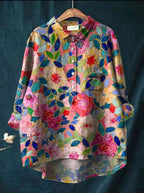 Back view showing longer hem detail of linen shirt