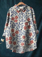 Model wearing floral linen shirt, standing pose