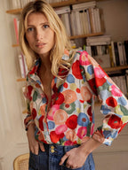 Side view of blouse showing relaxed fit and long sleeve length