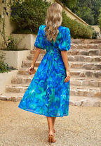 Detail shot of elasticated waist on floral maxi dress