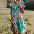 Women's floral V-neck midi dress displayed front-on, showing vibrant multicolour print