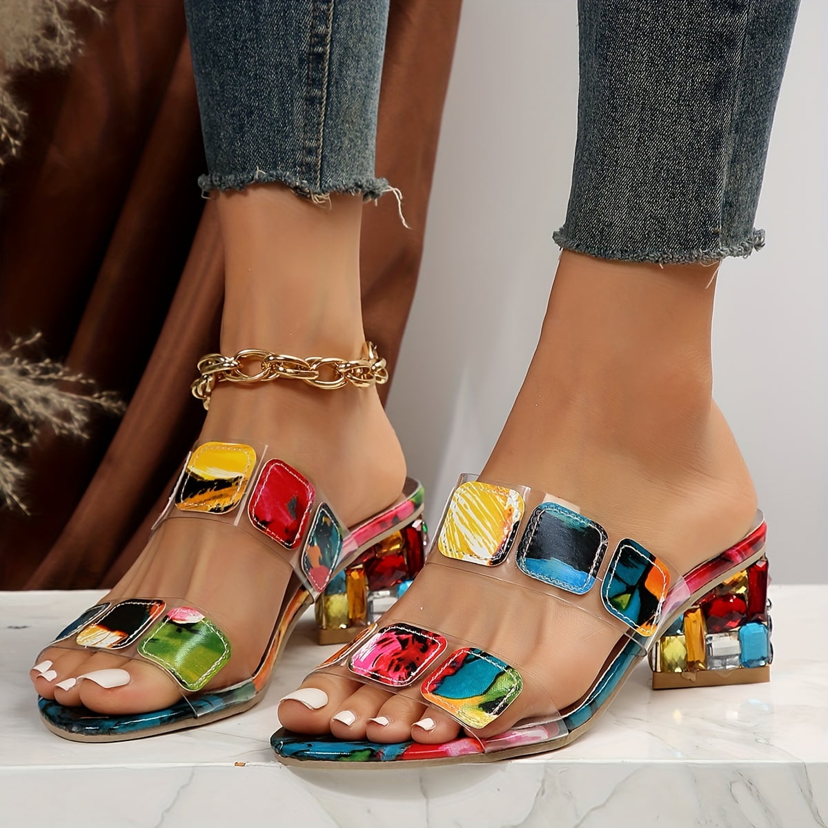 Side profile of jewel sandals showing chunky block heel and arch support detail