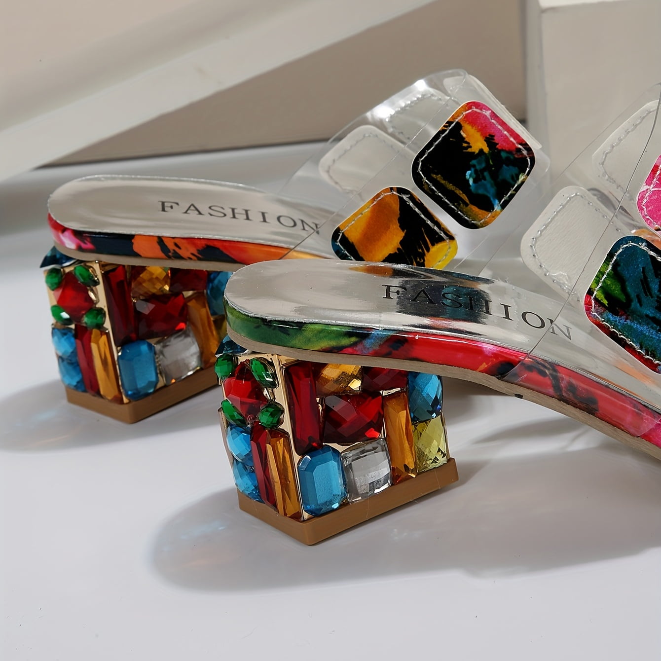 Woman wearing multicolour jewel sandals, styled for casual daytime look