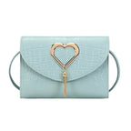 Crossbody bag at different angles showing shape and structure