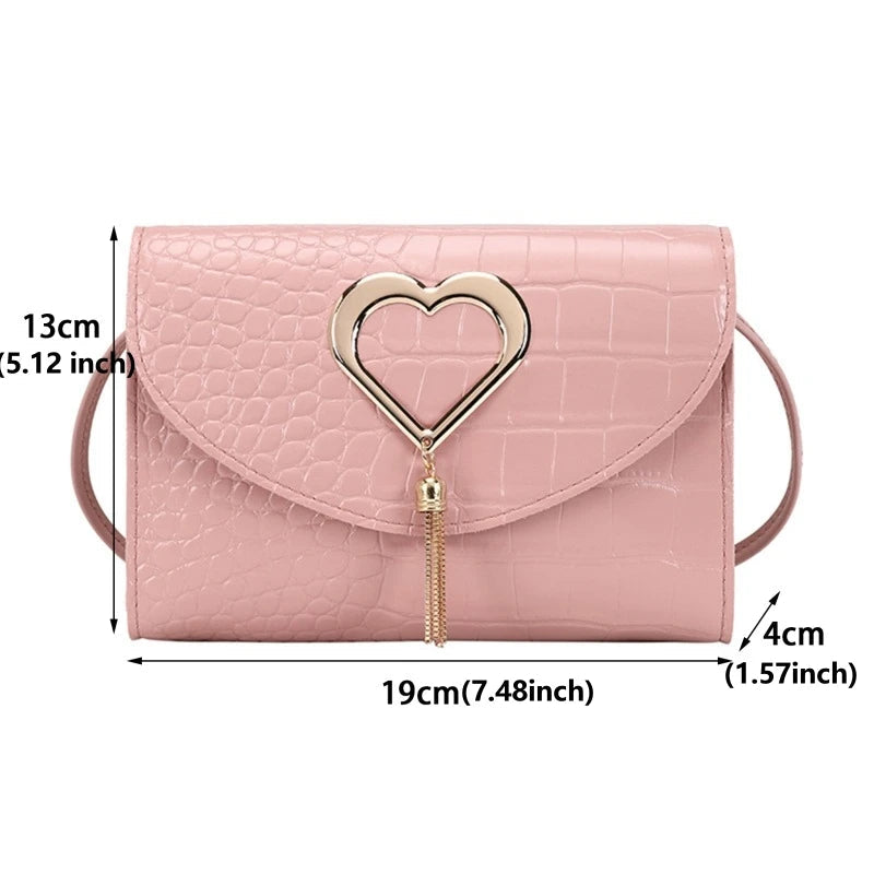 Woman holding crossbody bag, casual walk pose